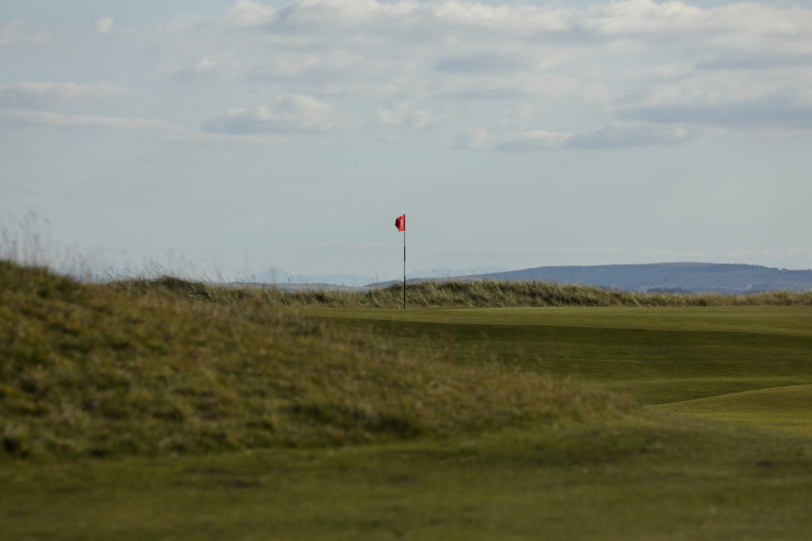 Royal Dornoch Golf Course in the Highlands with the 15th Hole overlooking the Moray Firth by AKH Golf Photography