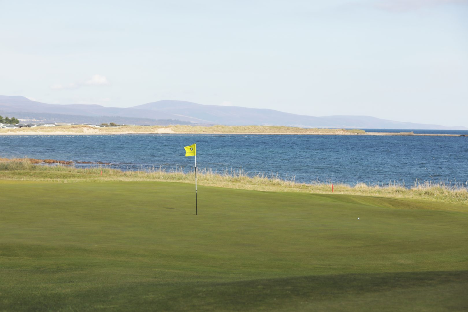 Royal Dornoch Golf Course in the Highlands with the 19h Hole overlooking the Moray Firth by AKH Golf Photography