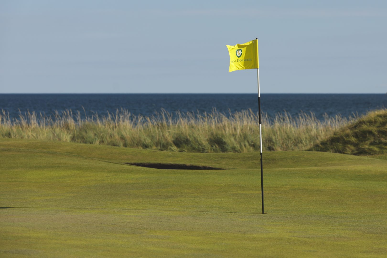 Royal Dornoch Golf Course in the Highlands with the 8th Hole overlooking the Moray Firth by AKH Golf Photography