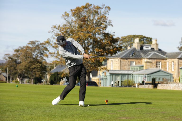 Opening drive struck on a wide Highland links fairway at Royal Dornoch