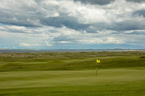 Royal Dornoch golf course with links dunes in the background